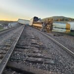 Wreckage after BNSF freight train carrying new vehicles derailed overnight in Coconino County, Arizona, near Williams.