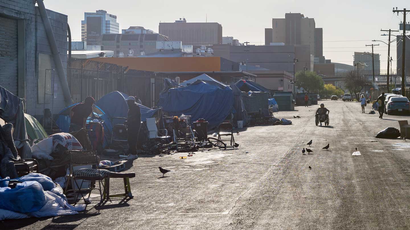 Photo of a homeless encampment in Phoenix. Six Arizona jurisdictions were awarded nearly $20 millio...