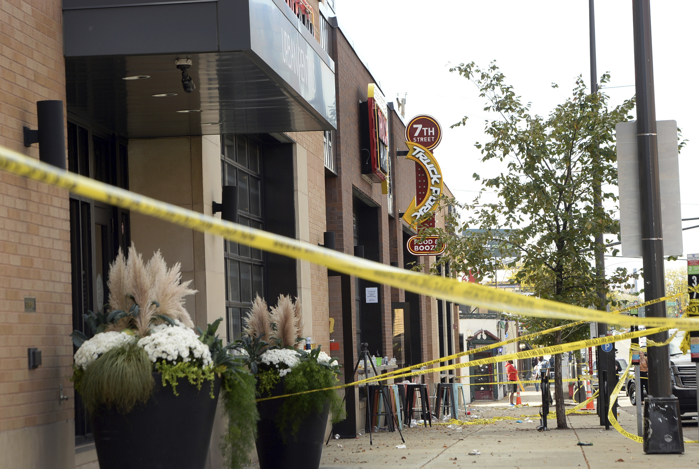 FILE - Crime scene tape surrounds the scene after an early morning shooting at the Seventh Street T...