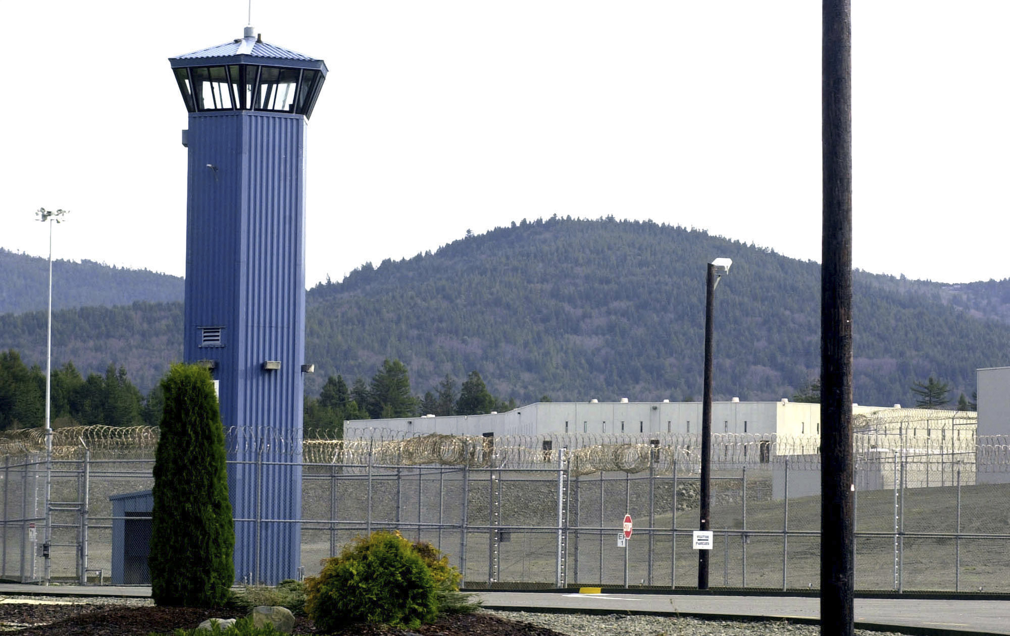 FILE - A tower stands at Pelican Bay State Prison outside of Crescent City, Calif. The Northern Cal...