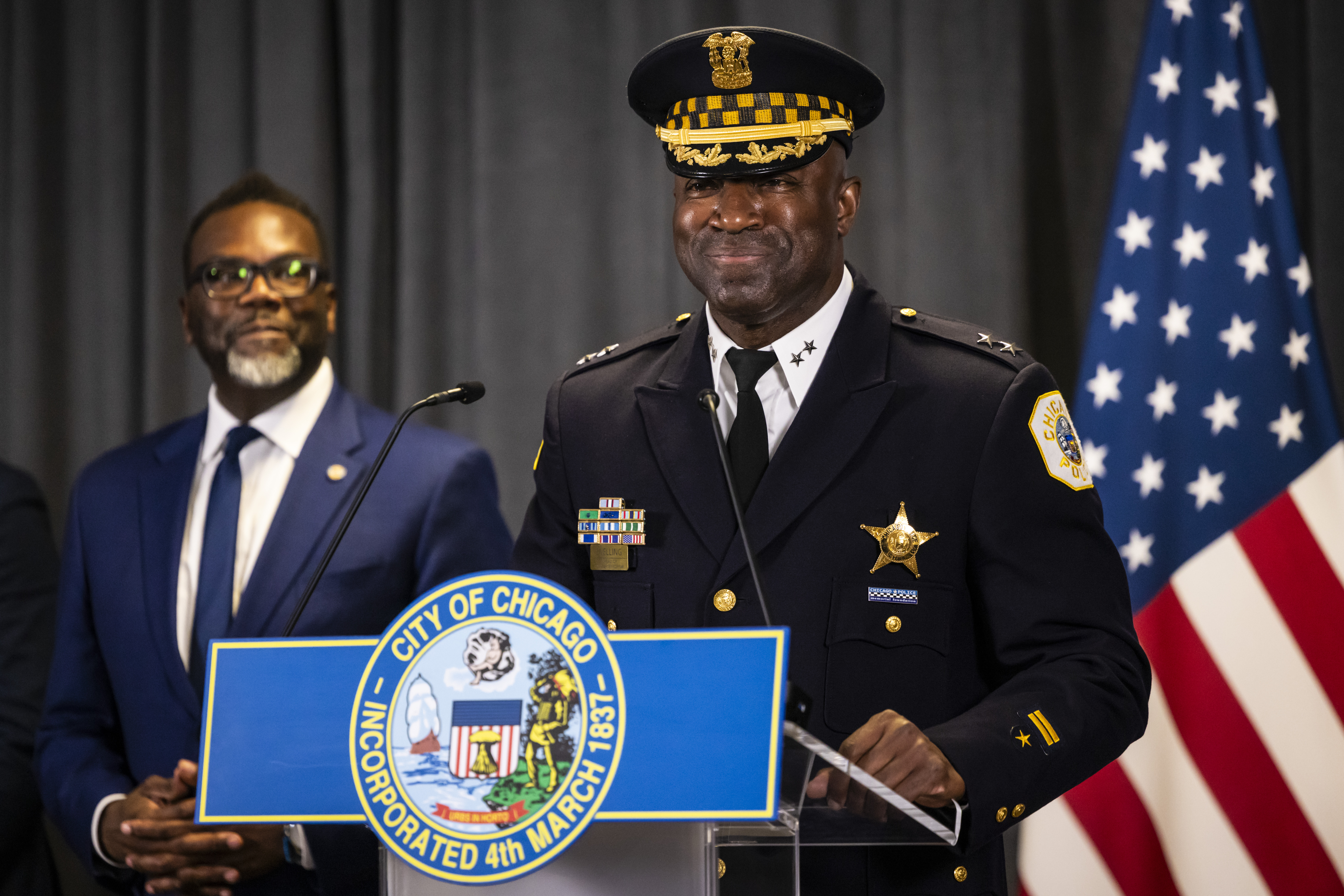 Mayor Brandon Johnson looks on as Chief Larry Snelling speaks during a news conference at City Hall...