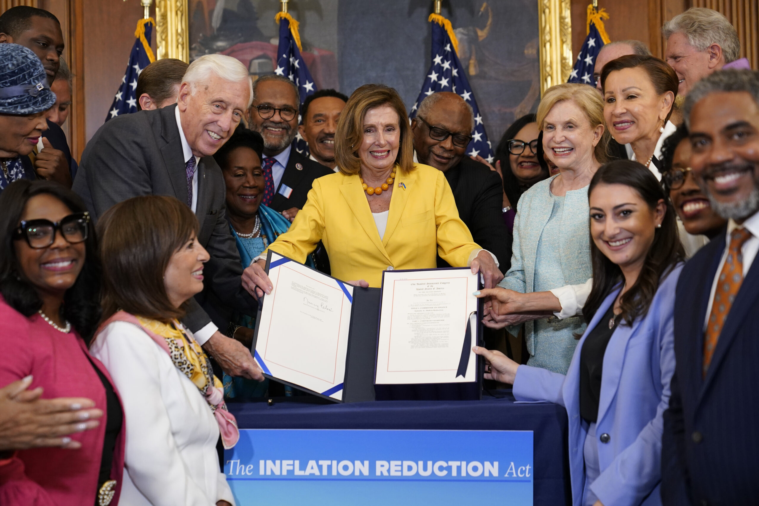 FILE - House Speaker Nancy Pelosi of Calif., and the House Democrats with her, celebrate after Pelo...