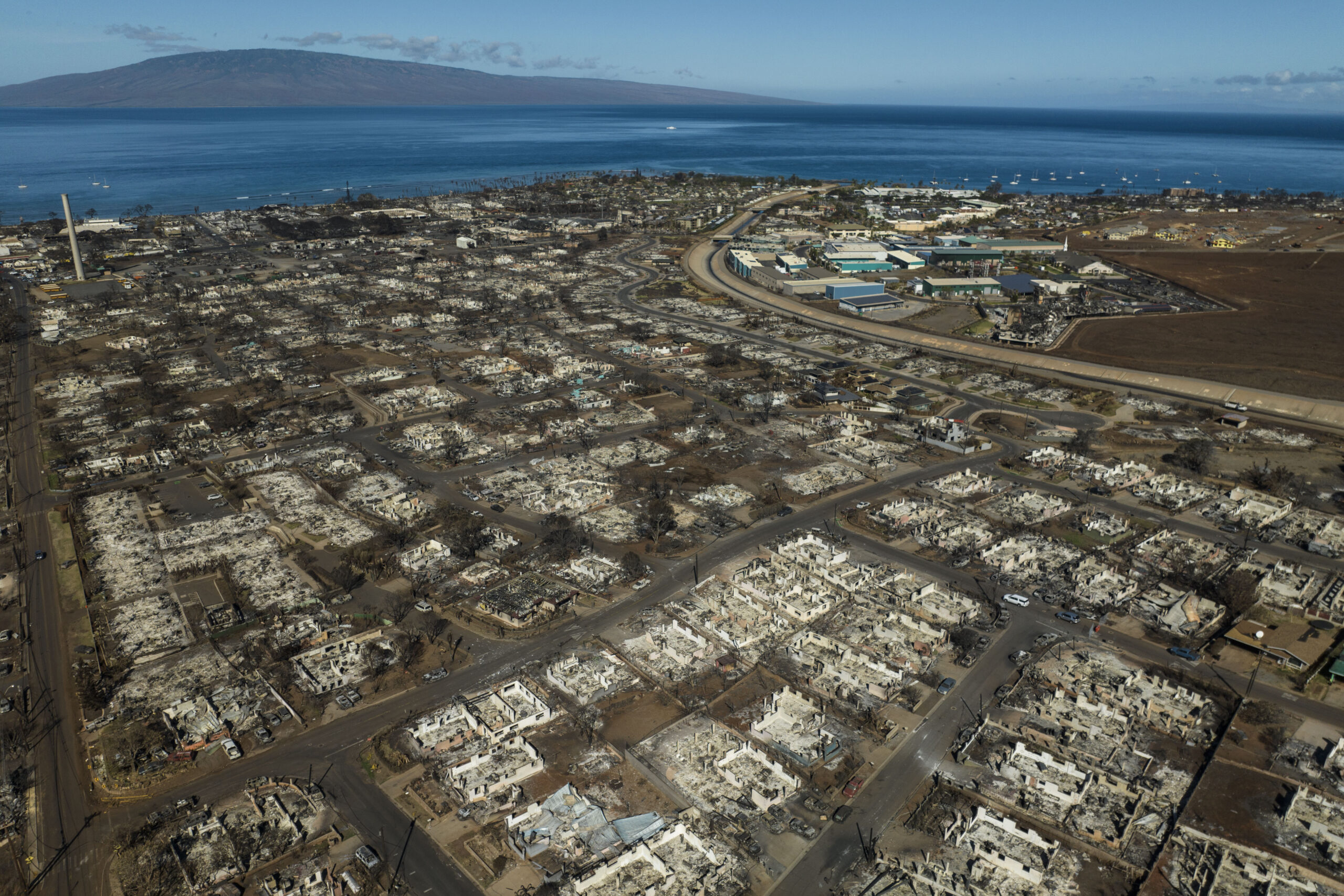 FILE - The aftermath of a wildfire is visible in Lahaina, Hawaii, Aug. 17, 2023. When the most dead...