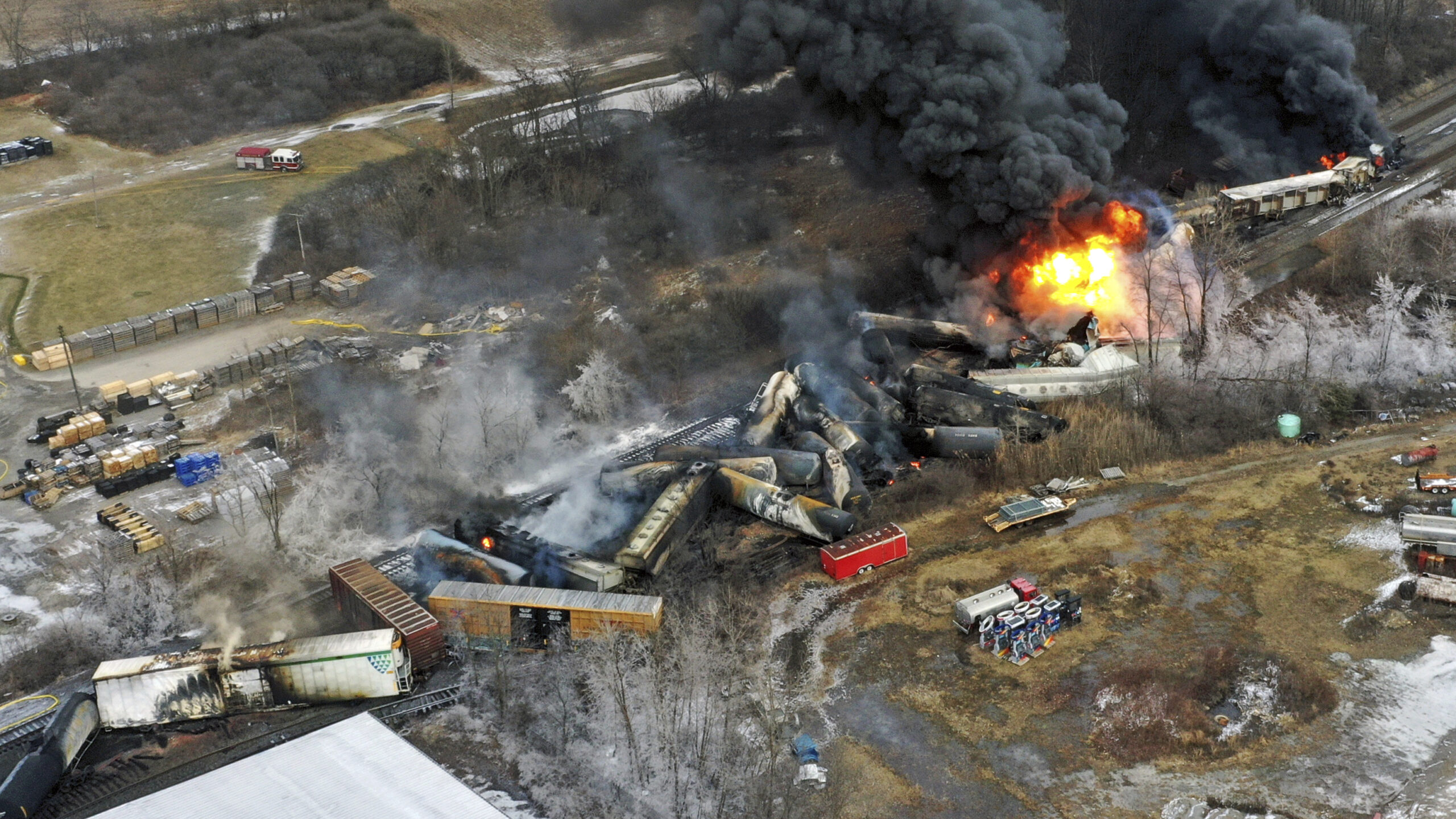 FILE - In this photo taken with a drone, portions of a Norfolk Southern freight train that derailed...