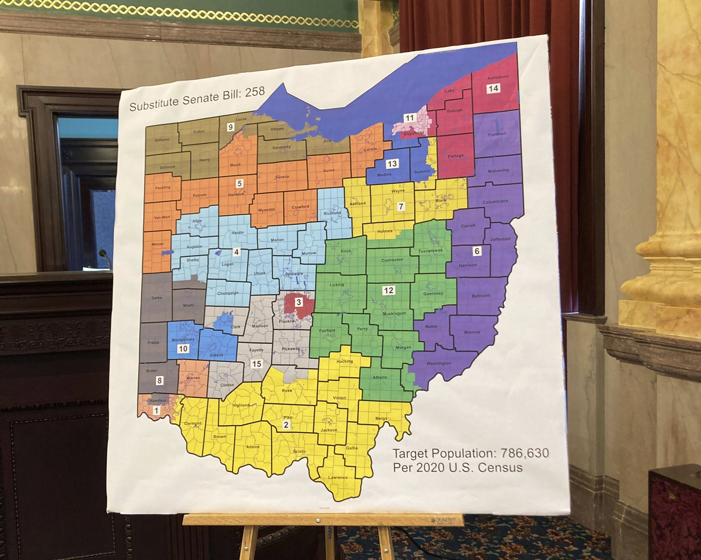FILE - A map of Ohio congressional districts is displayed during a committee hearing at the Ohio St...