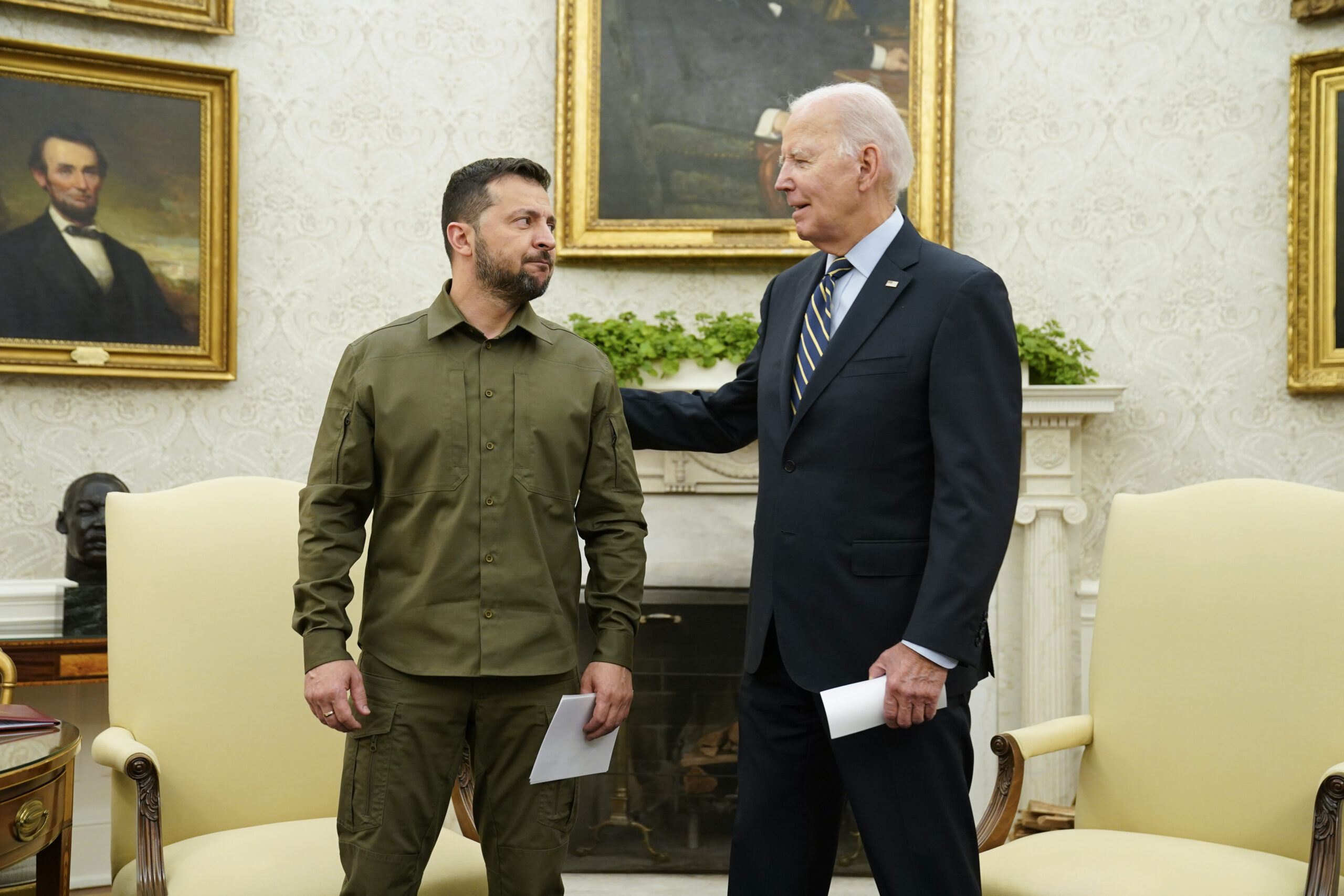 FILE - President Joe Biden meets with Ukrainian President Volodymyr Zelenskyy in the Oval Office of...