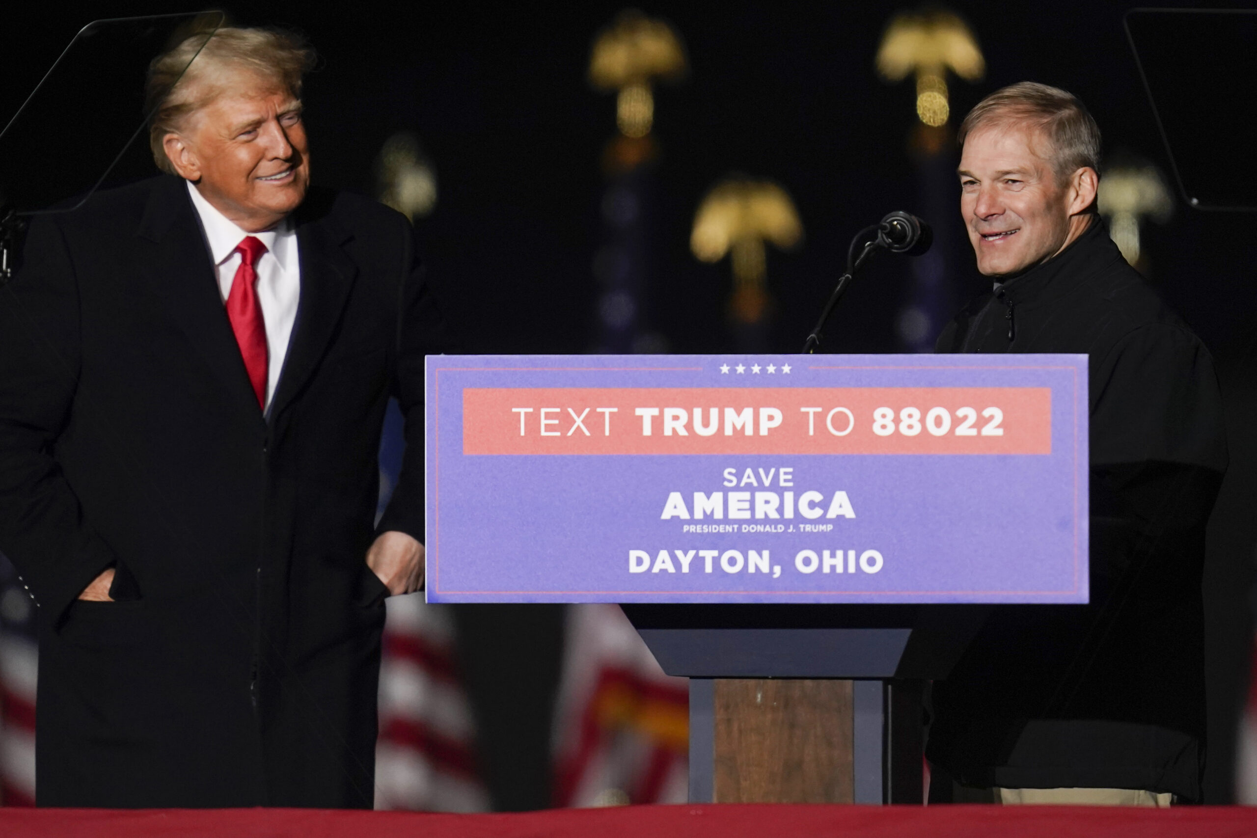 FILE - Former President Donald Trump welcomes Rep. Jim Jordan, R-Ohio, to the stage at a campaign r...
