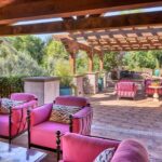 Pink furniture on the patio of an expensive home for sale in Paradise Valley, Arizona