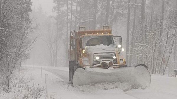 Snow plows work to clear SR-89A near Sedona. (@ArizonaDOT/X photo)...