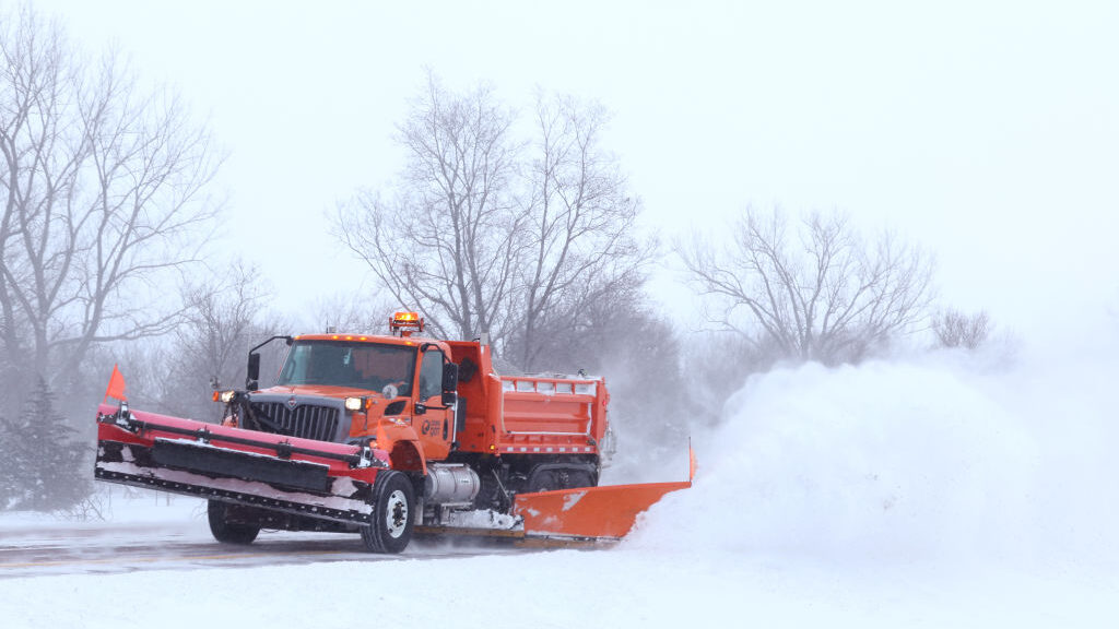 A snow plow clears  I-25 during blizzard like conditions on January 13, 2024 in Blencoe, Iowa. The ...