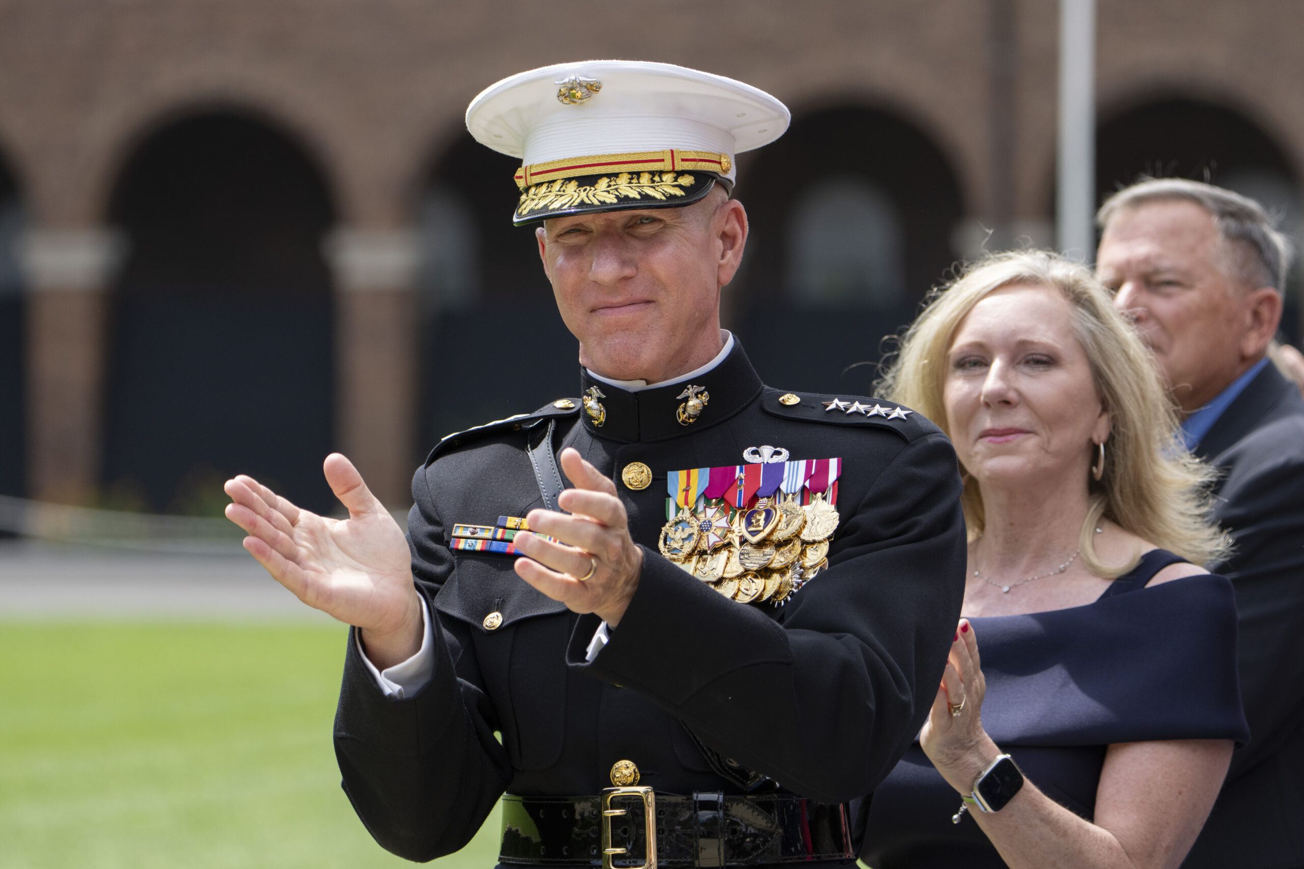 FILE - Acting Commandant of the U.S. Marine Corps Gen. Eric Smith applauds during a relinquishment ...