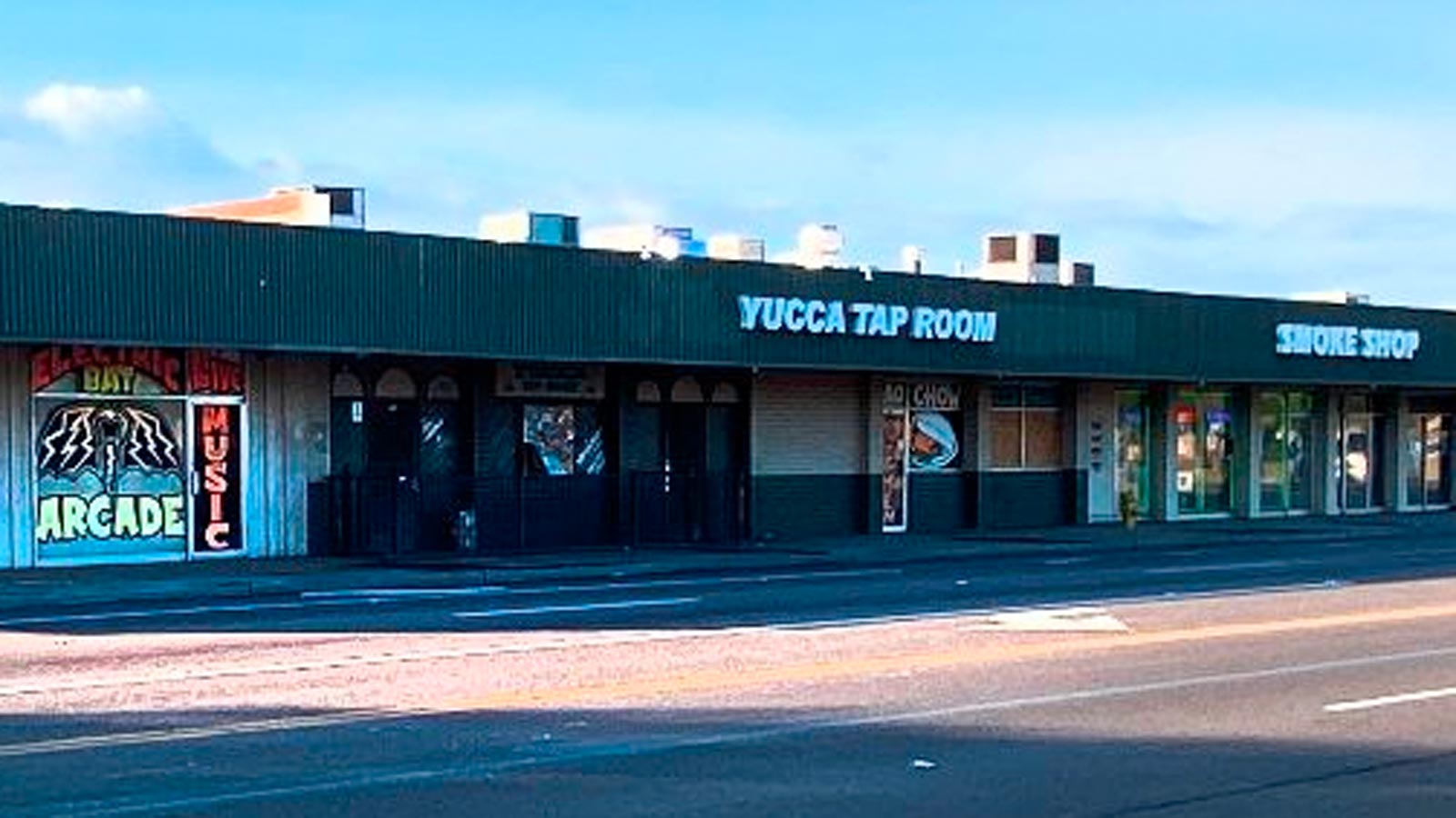 Photo of the Yucca Tap Room and neighboring businesses in Danelle Plaza on Southern Avenue in Tempe...