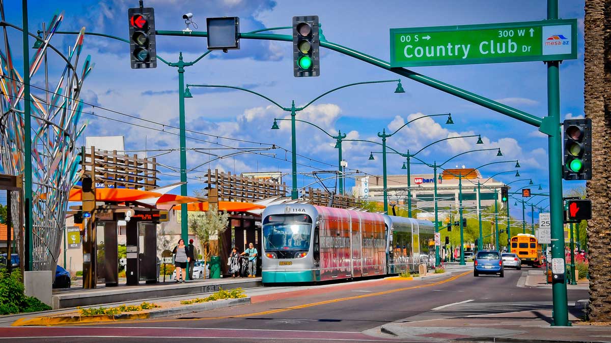 A train is seen at the Valley Metro light rail station at Main Street and Country Club Drive in Mes...
