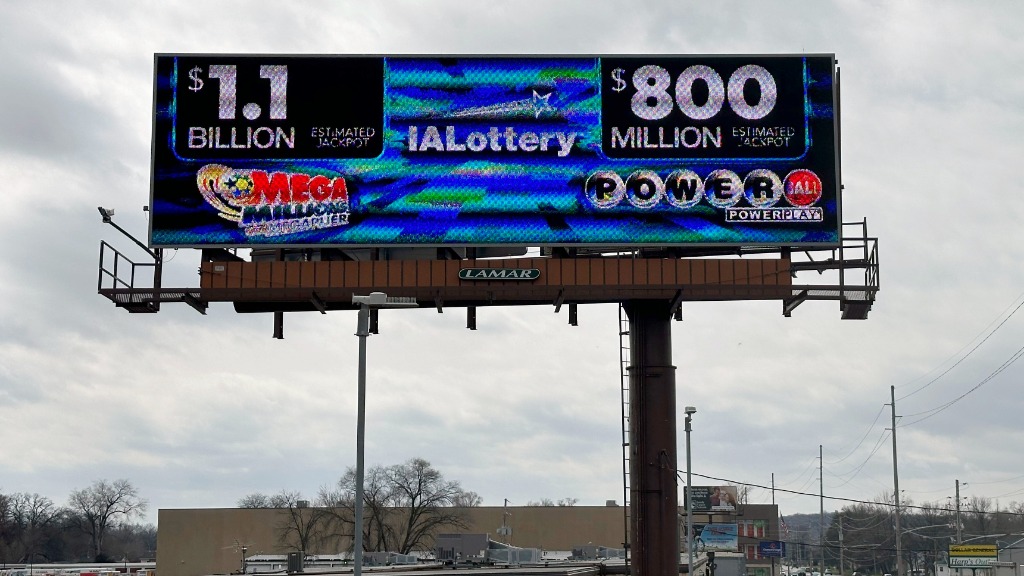 An electronic billboard advertises the Mega Millions and Powerball jackpots, Monday, March 25, 2024...