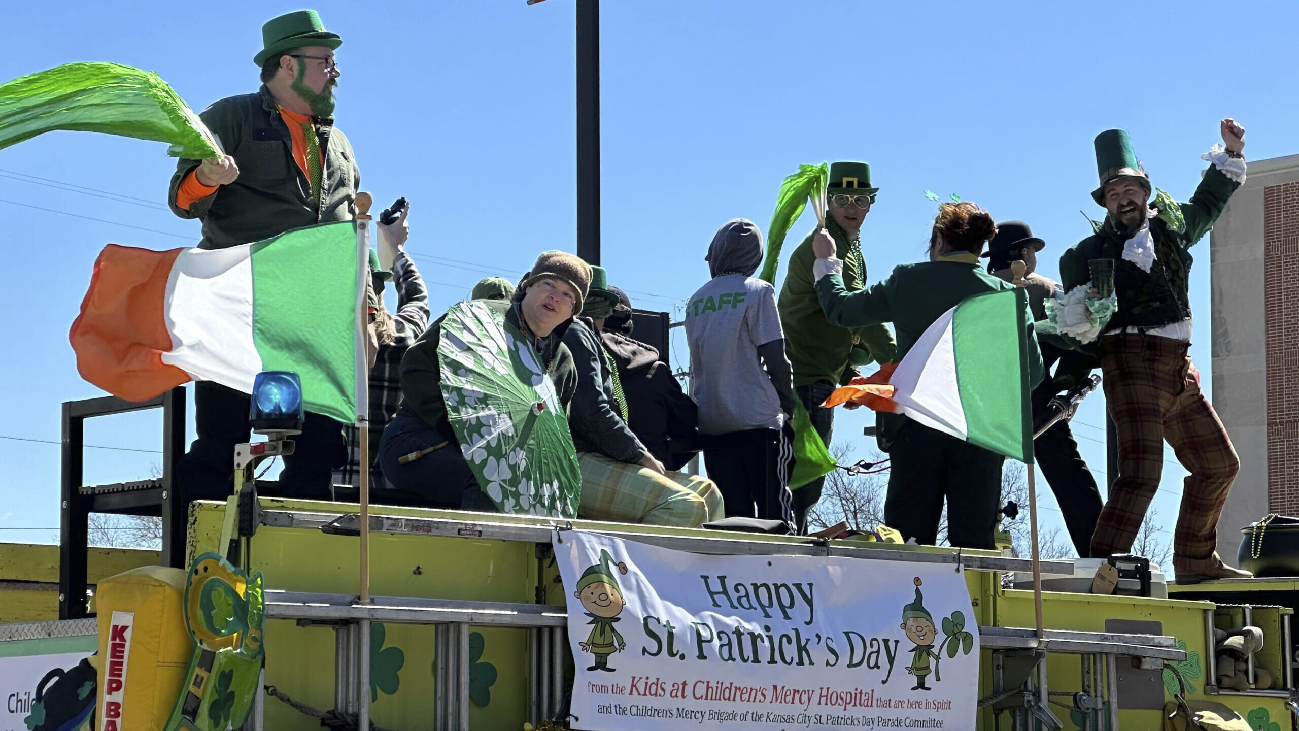 People celebrate the St. Patrick's Day parade on Sunday, March 17, 2024, in Kansas City, Mo. This y...
