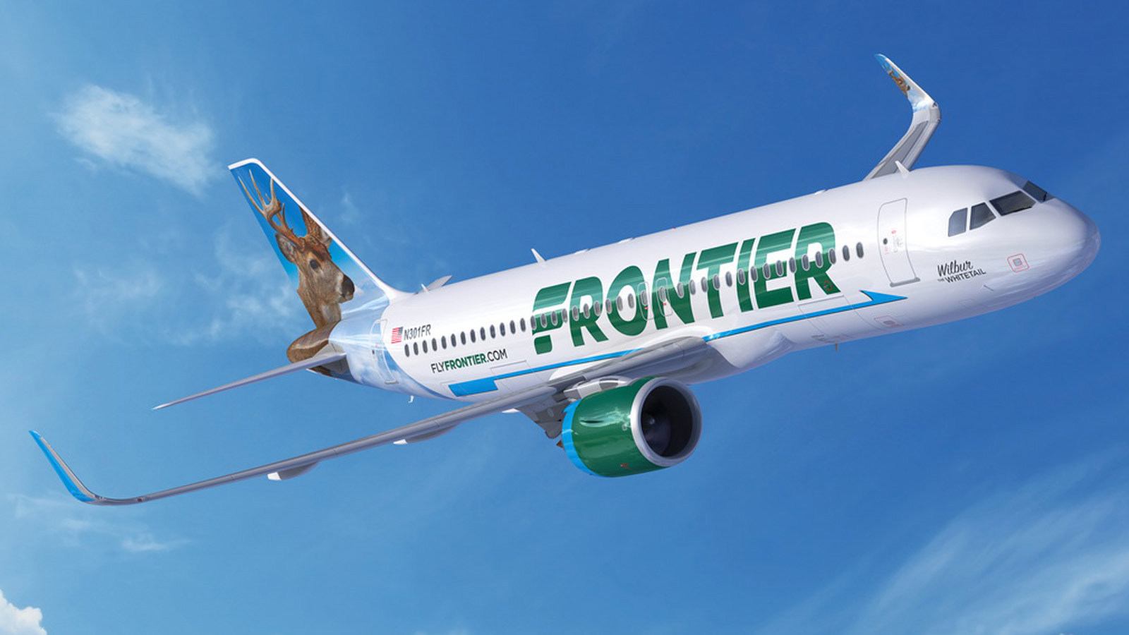 Company-provided photo of a Frontier Airlines airplane in the sky...