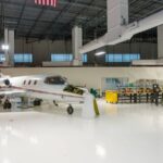 A plane sits in a hangar inside the Aviation Institute of Maintenance's new campus in Phoenix, Arizona