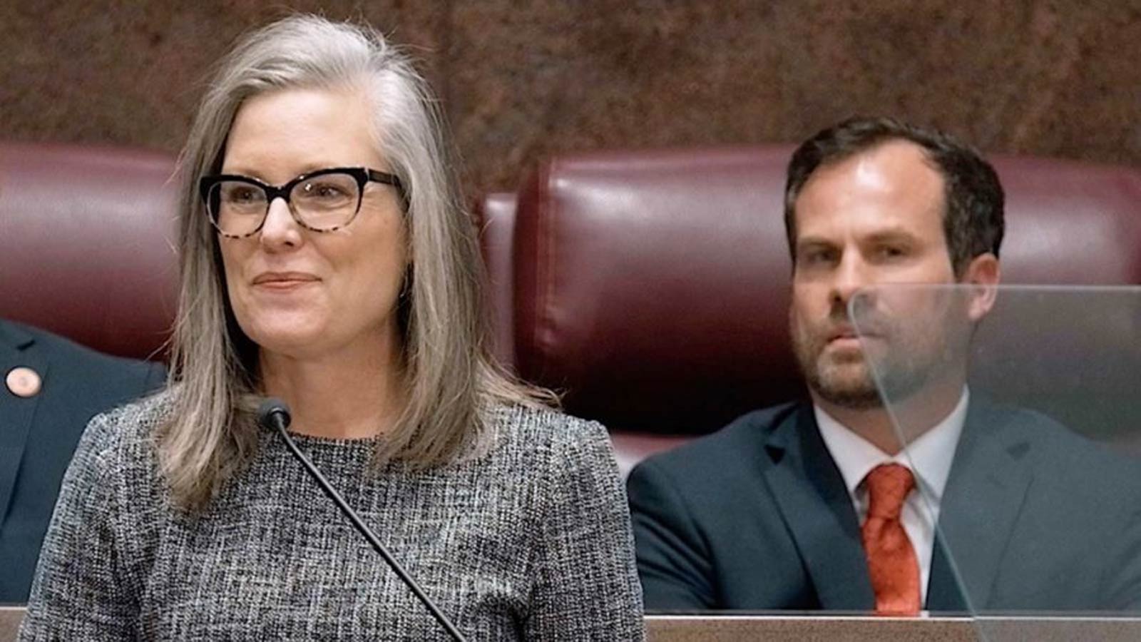 Arizona Senate President Warren Petersen, right, looks on during Gov. Katie Hobbs' 2023 State of the State address. Petersen said GOP lawmakers are working to pass border legislation despite the threat of Hobbs' veto stamp.