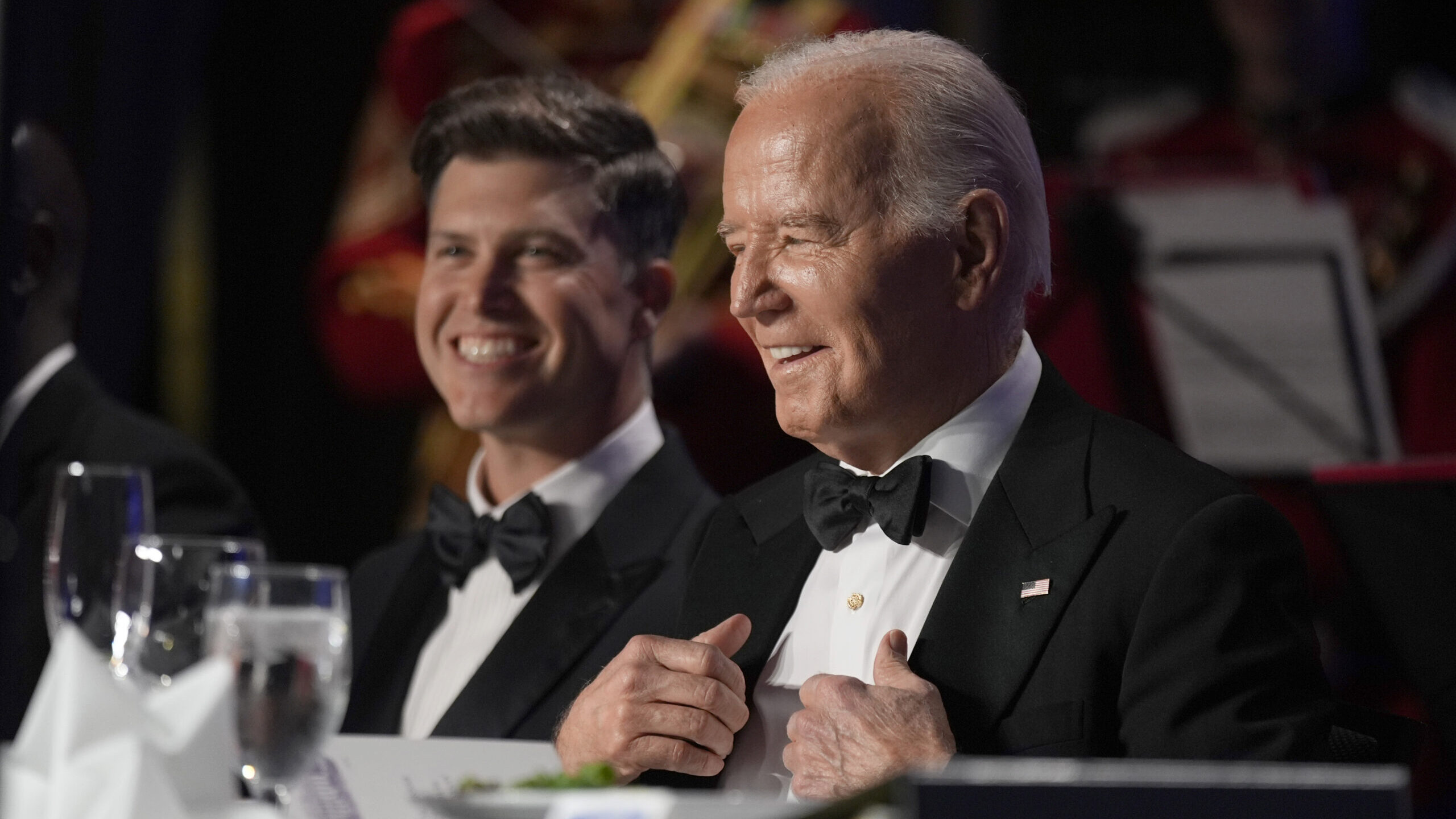 President Joe Biden, right, and host Colin Jost attend the White House Correspondents' Association ...