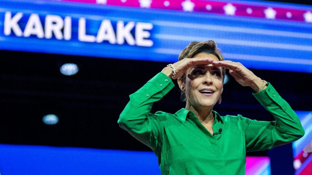 Kari Lake looks at the crowd to arrives to speak at the Conservative Political Action Conference, C...