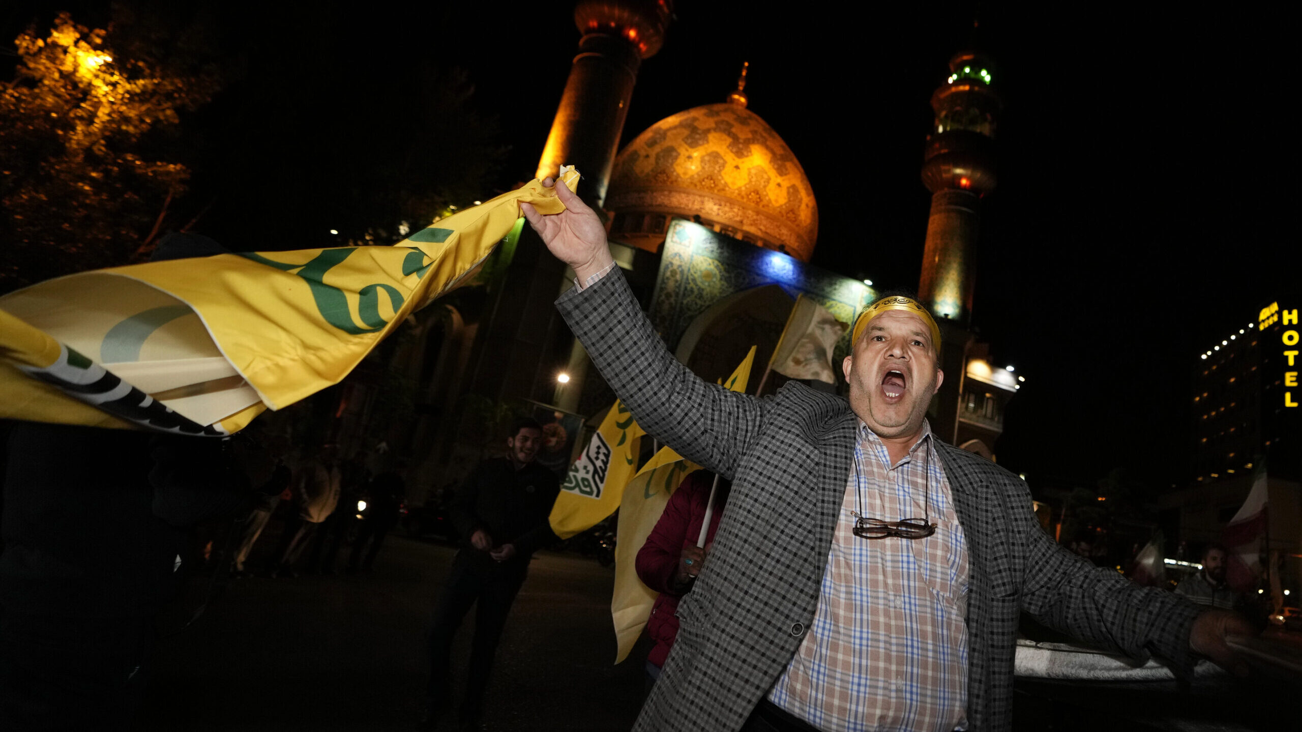An Iranian demonstrator chants slogans while attending an anti-Israeli gathering at the Felestin (P...
