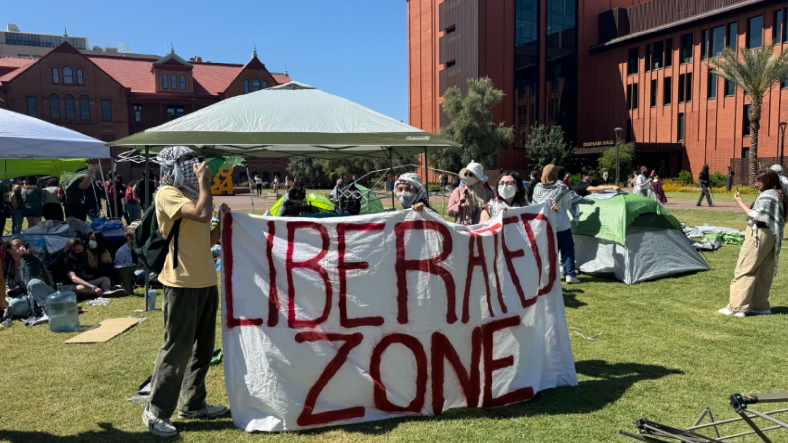Pro-Palestine activists set up tents police tore down at ASU campus...