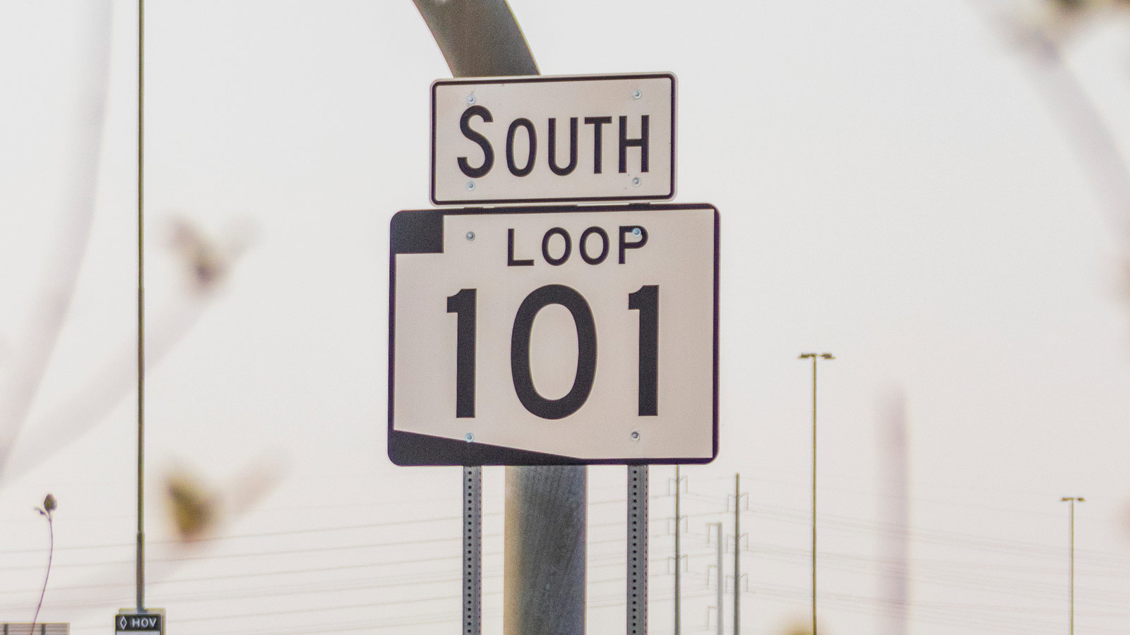 A freeway sign on a poll says South Loop 101. Part of the southbound Loop 101 in Tempe will be closed for roadwork from April 19 to April 22, 2024, as part of metro Phoenix freeway restrictions.