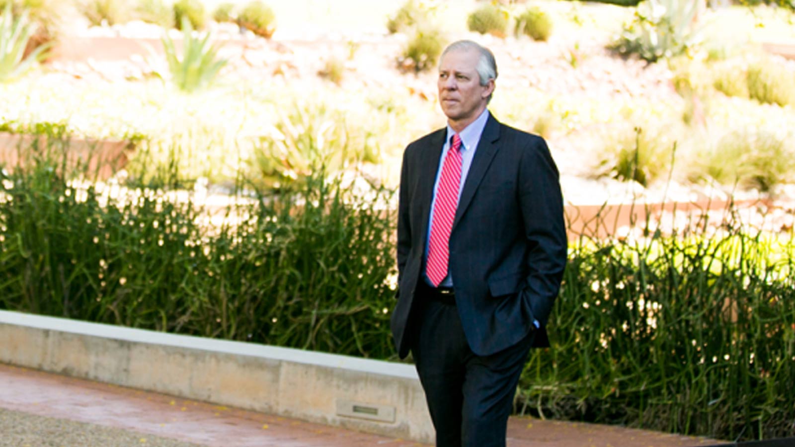 University of Arizona President Robert Robbins is seen walking on the Tucson campus....