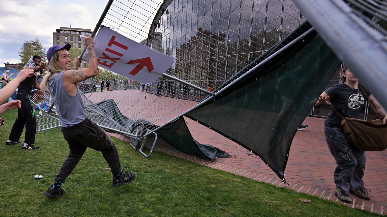 Pro-Palestinian protesters break through barriers at MIT...