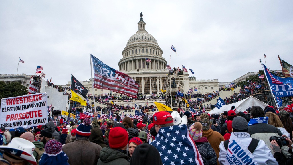 FILE - Rioters loyal to President Donald Trump rally at the U.S. Capitol in Washington, Jan. 6, 202...
