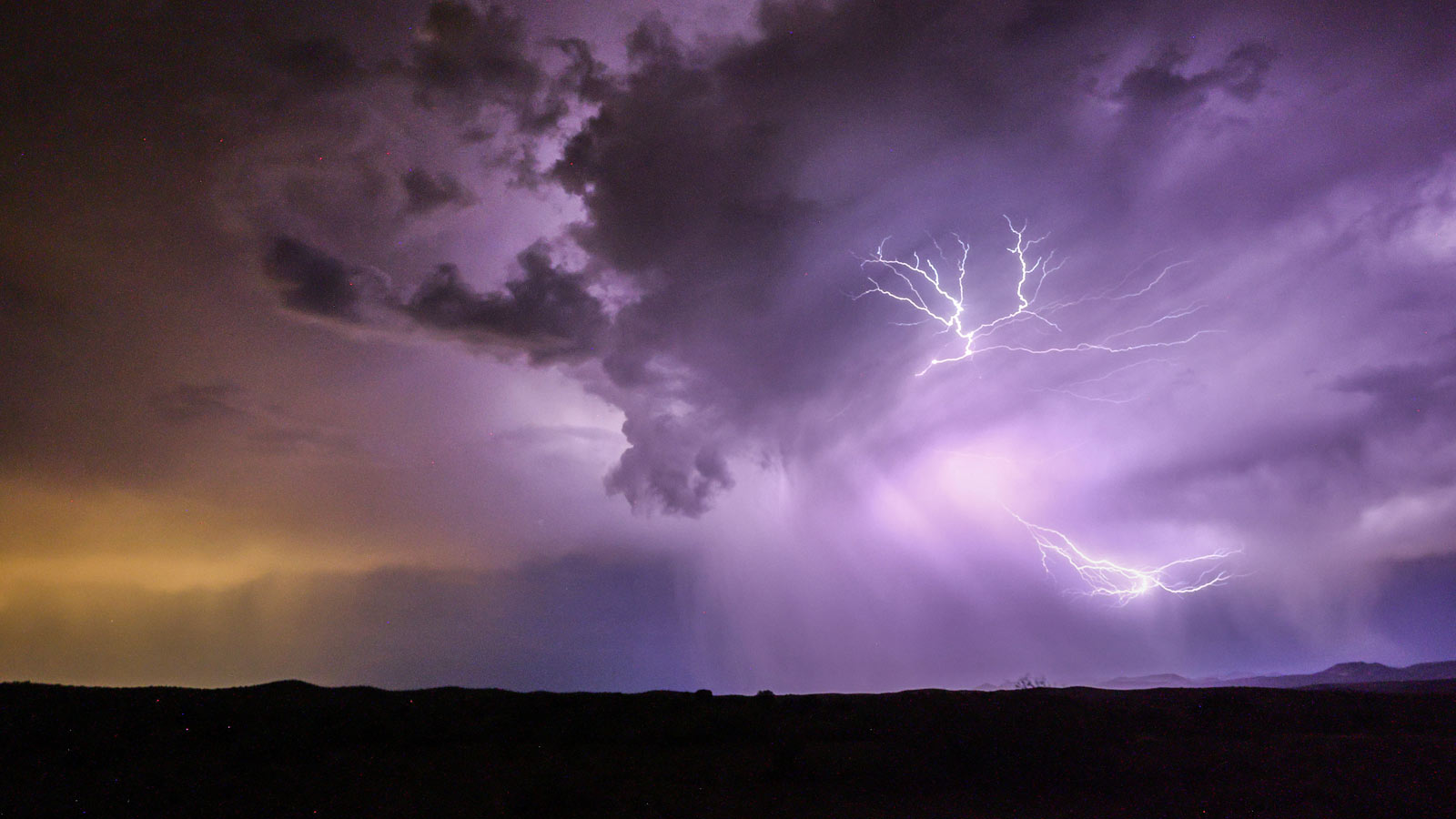 Lightning strikes during a monsoon storm on July 21, 2022, near Mayer, Arizona. The Arizona monsoon...