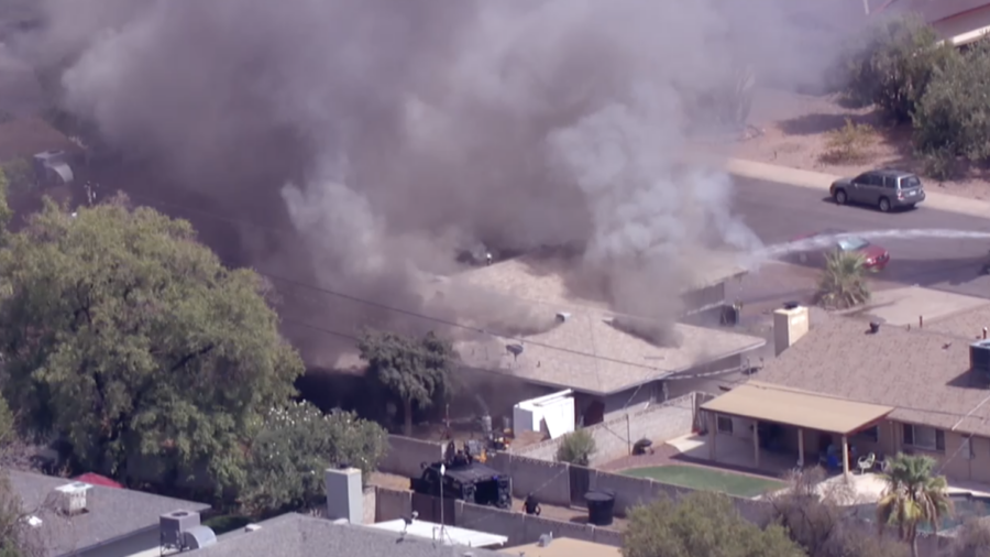A home on fire in Tempe, Arizona....