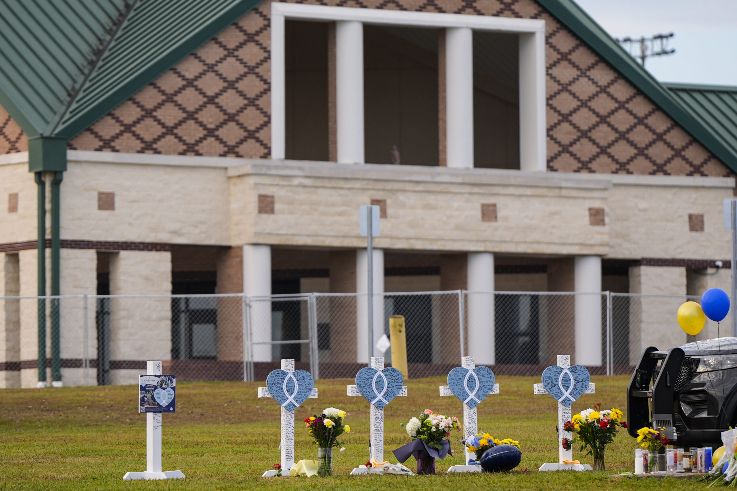 A memorial is seen at Apalachee High School after the Wednesday school shooting, Saturday, Sept. 7,...