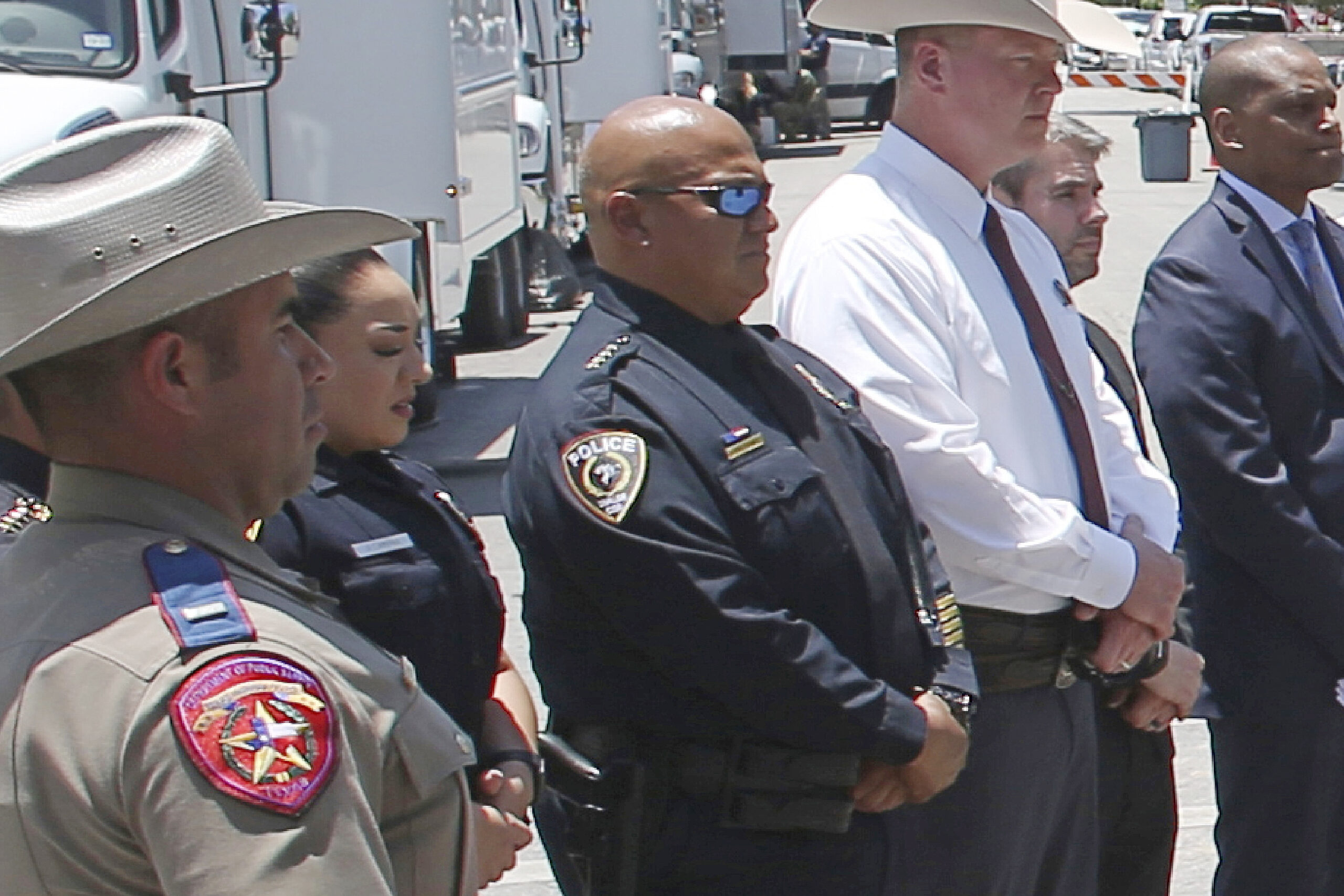 FILE - Uvalde School Police Chief Pete Arredondo, center, stands during a news conference outside o...