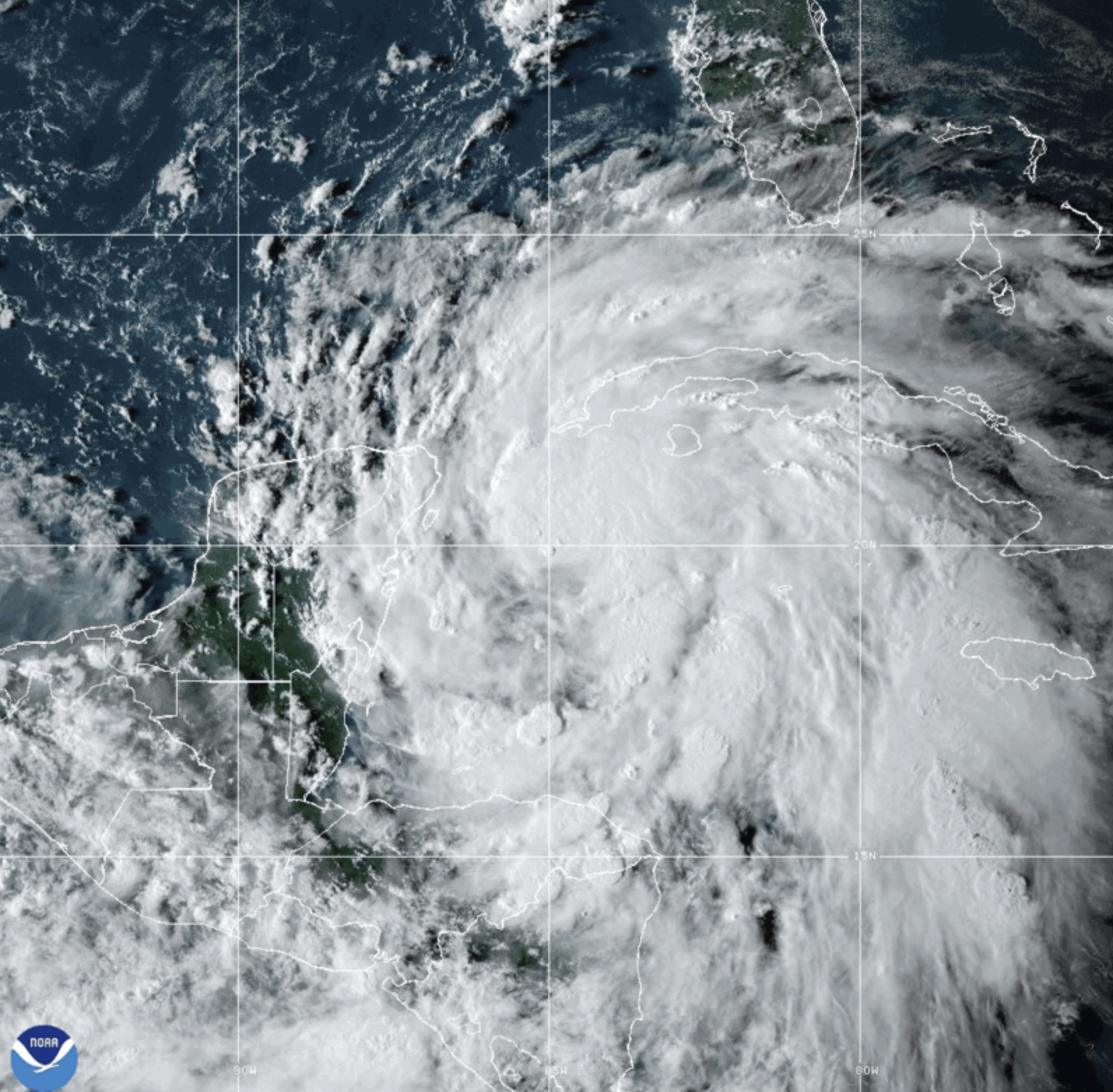 This National Oceanic and Atmospheric Administration satellite image taken at 6:10pm ET shows Tropi...