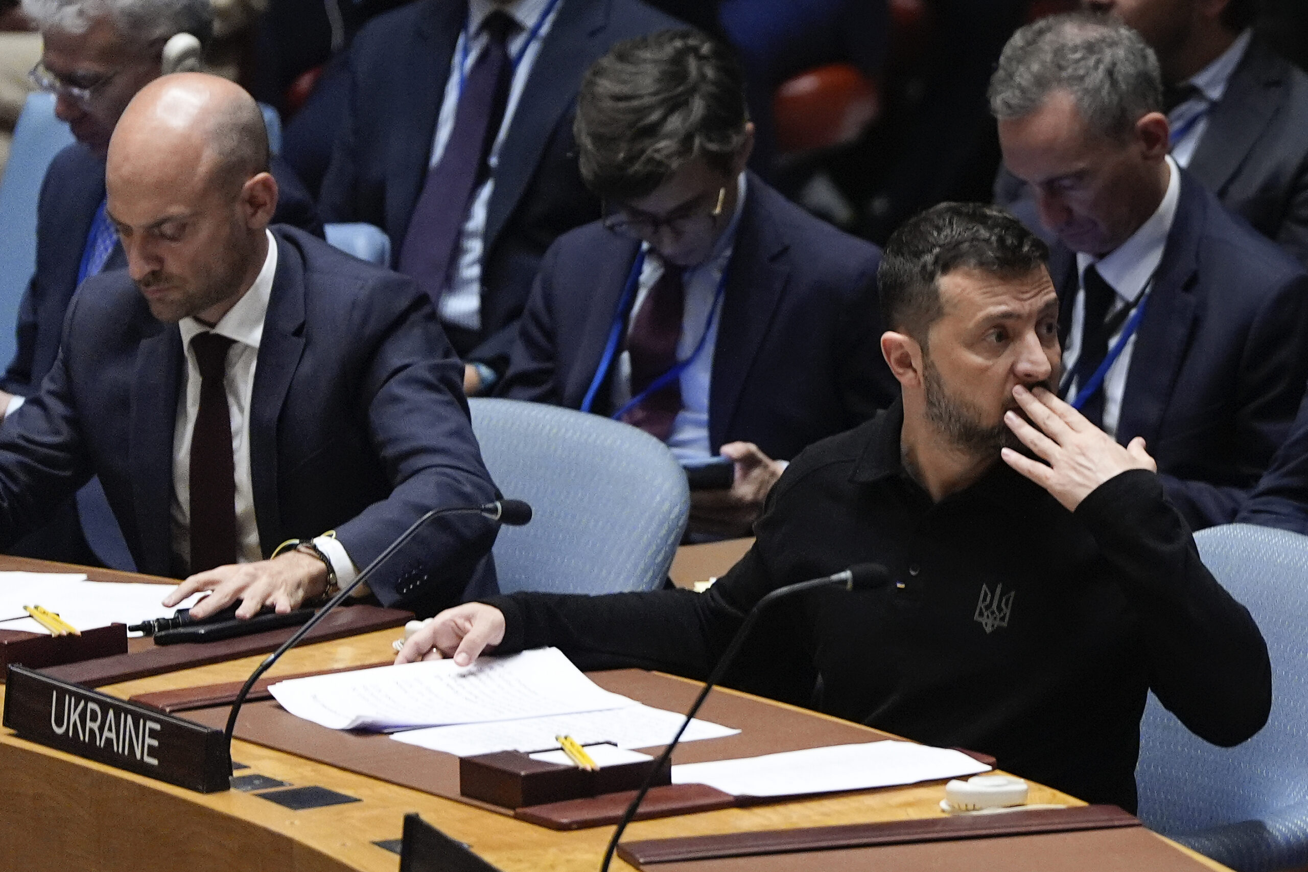 Ukraine President Volodymyr Zelenskyy, right, attends a Security Council meeting, Tuesday, Sept. 24...