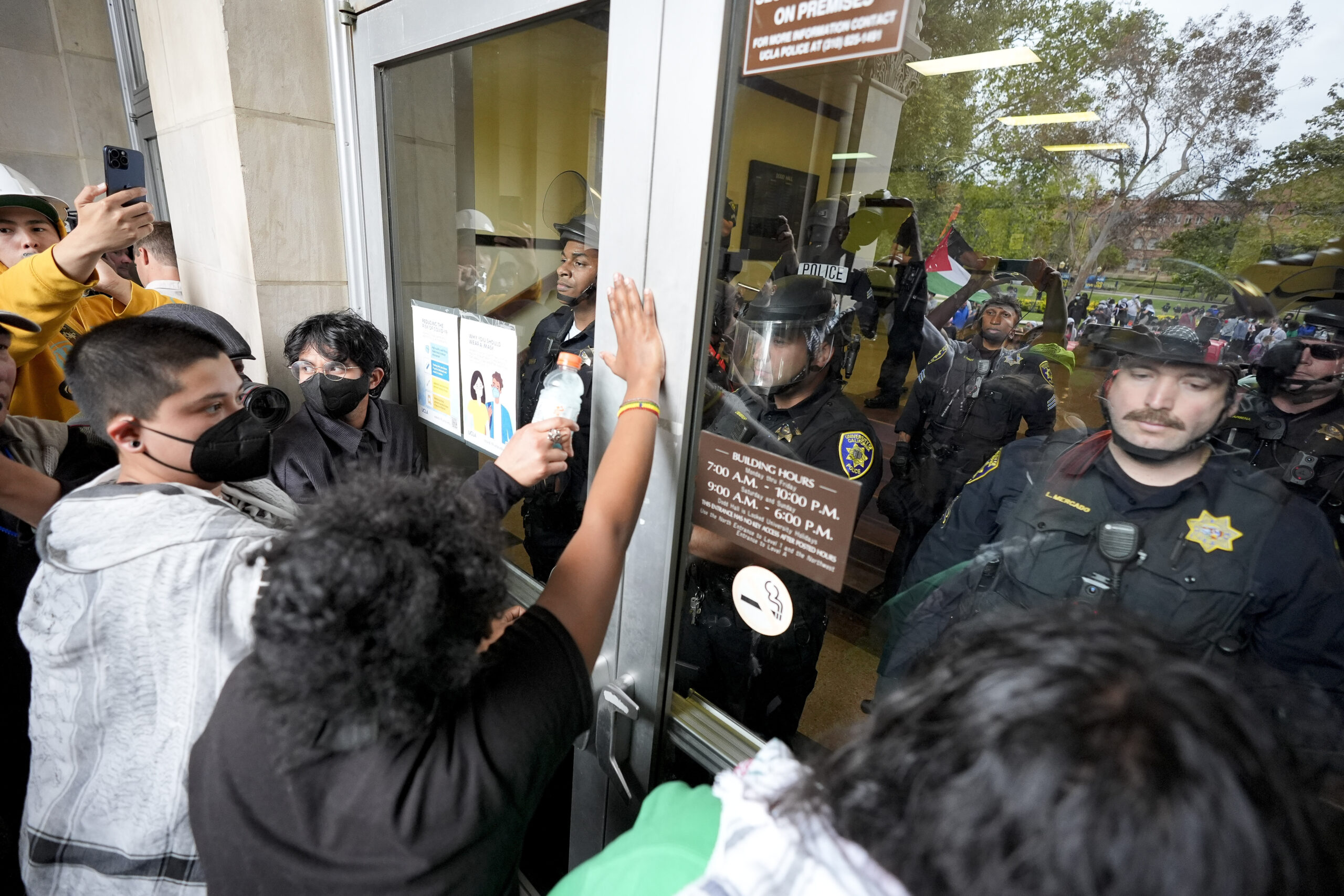 FILE - Police block pro-Palestinian demonstrators from entering a building on the UCLA campus, May ...