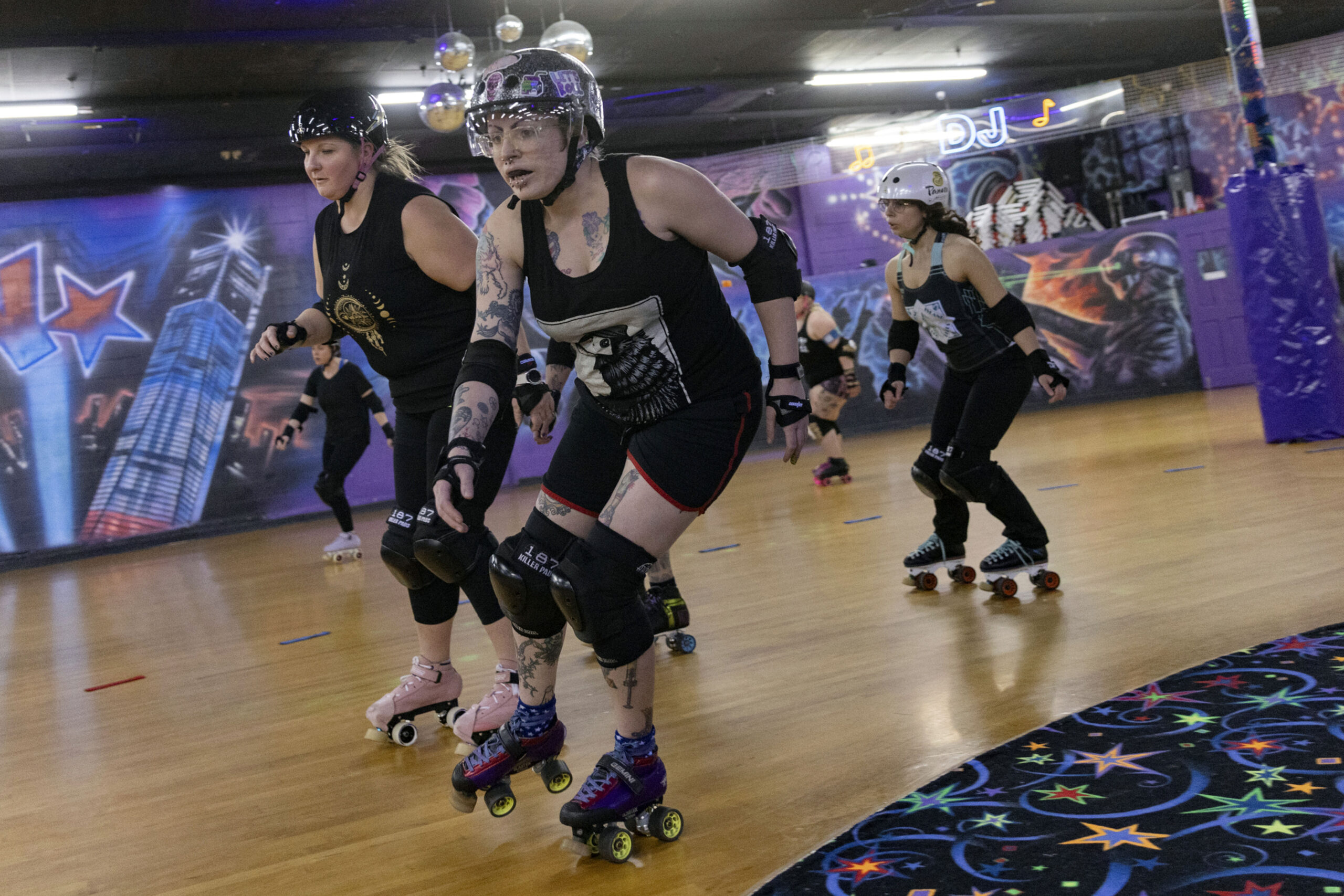 FILE - Members of the Long Island Roller Rebels practice, Mar. 19, 2023, at United Skates of Americ...