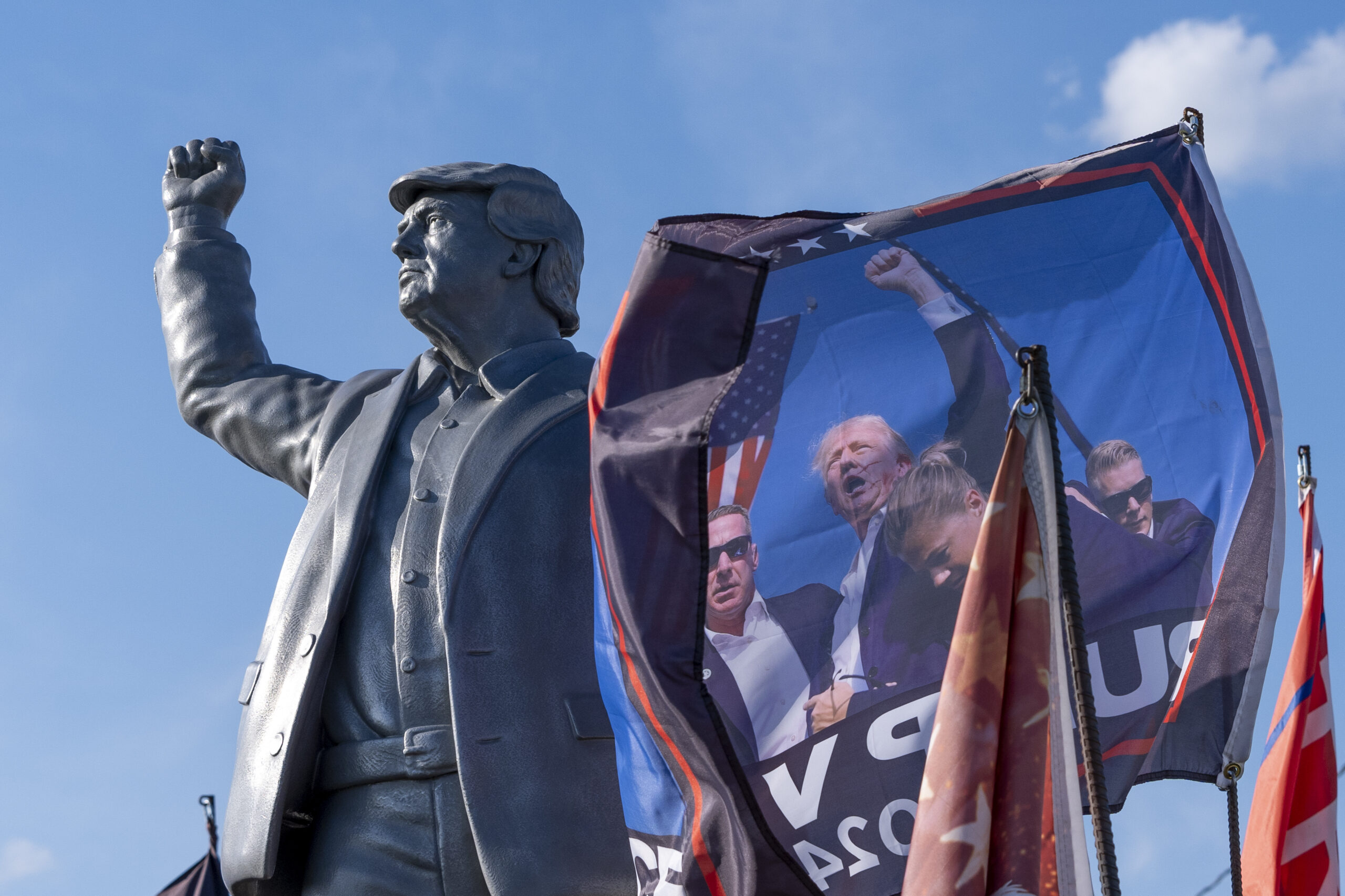 A statue of Republican presidential nominee former President Donald Trump is set up on a truck ahea...