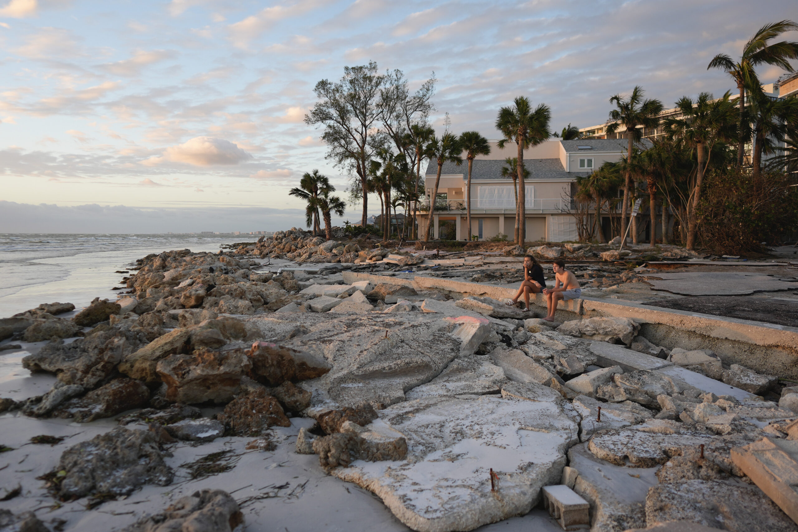 Young people from Sarasota, Fla., visit a familiar beach on Siesta Key, Fla., which they say was al...