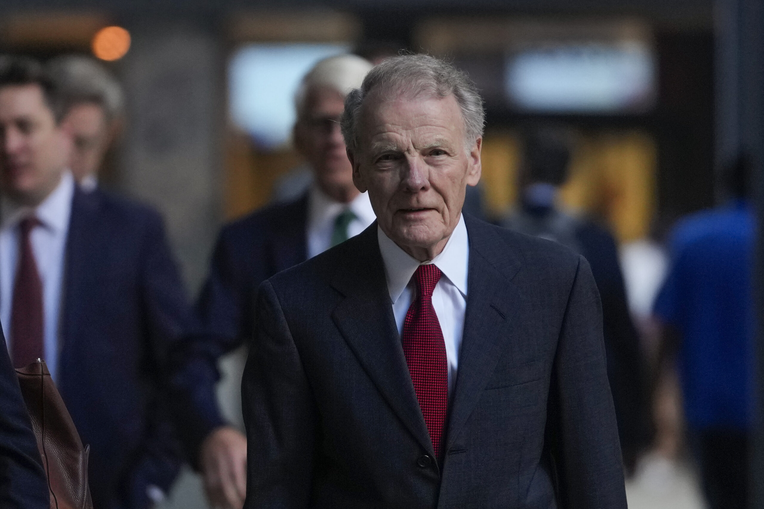 Former Illinois House Speaker Michael Madigan arrives at federal court where he is on trial for cha...