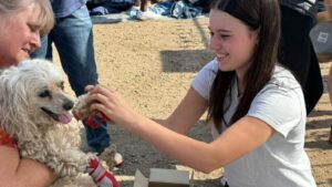 Phoenix teen honored by PETA youth group for dog boot distribution campaign