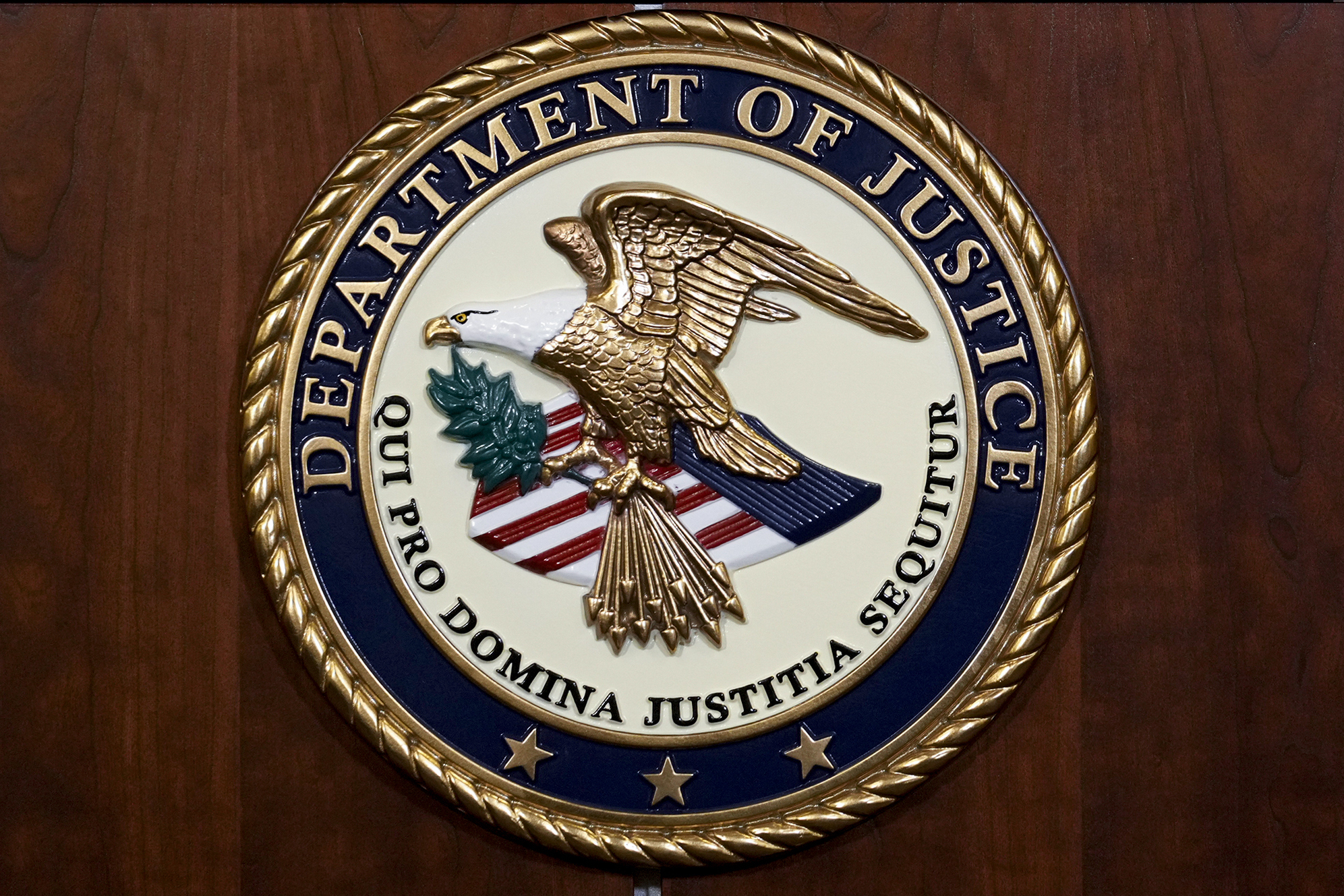 FILE - The seal of the Department of Justice, Aug. 1, 2023, at the Department of Justice in Washing...