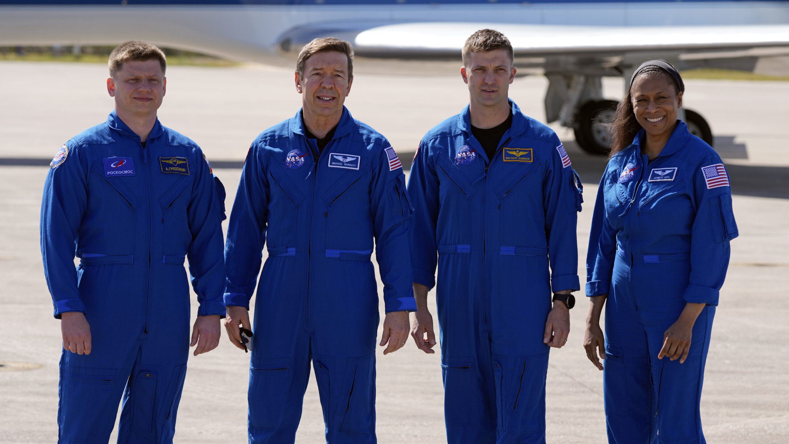 The SpaceX crew of the Dragon spacecraft, from left, cosmonaut Alexander Grebenkin, pilot Michael B...