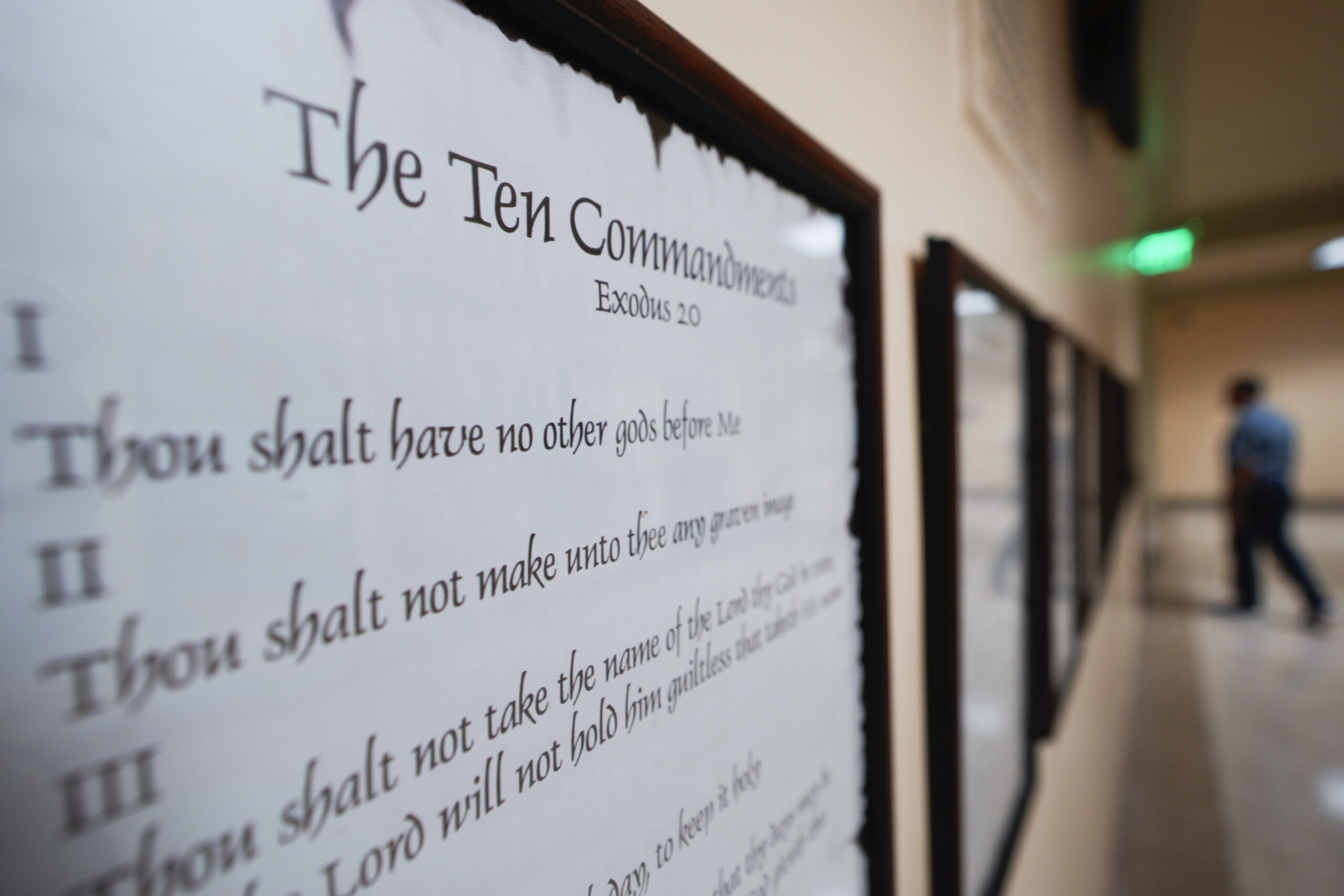 FILE - A copy of the Ten Commandments is posted along with other historical documents in a hallway ...