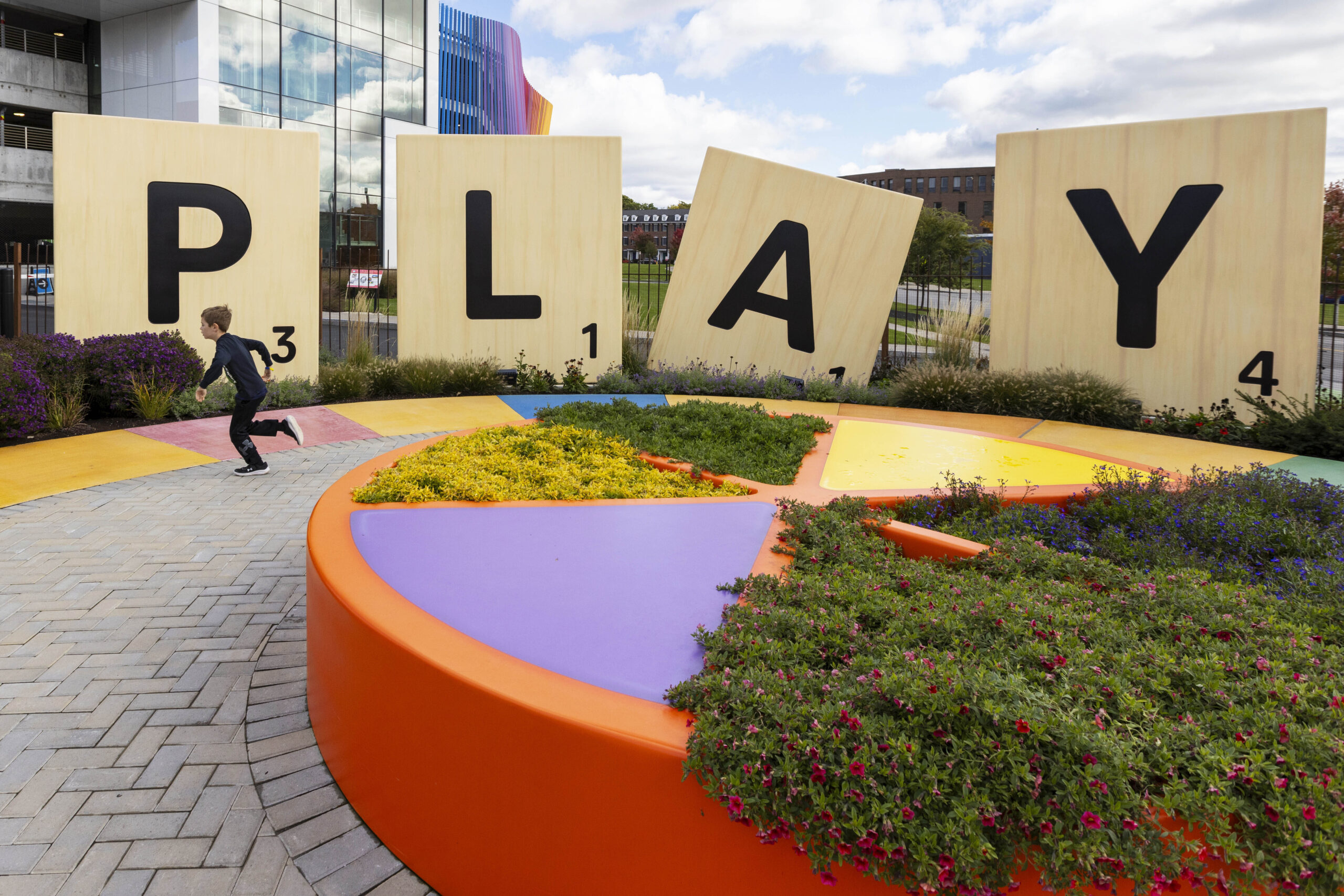 Large scrabble letters line the outdoor Hasbro Game Park at The Strong National Museum of Play, Tue...