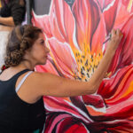 20240127 - Tempe Blooms - Tempe, Ariz. - woman paints flower mural 