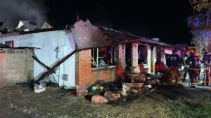 Woman found dead at overnight double house fire in Phoenix