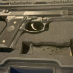 A confiscated firearm is seen sitting on a table at Phoenix Sky Harbor International Airport on Feb. 12, 2025. (Serena O'Sullivan/KTAR News Photo)