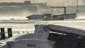 Delta jet flips upside down on a snowy Toronto runway and all 80 aboard survive
